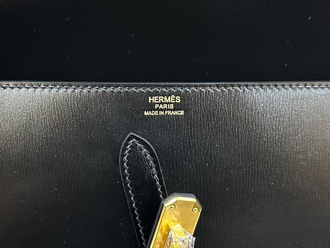 SS 2026 Shiny Leather Clutch
