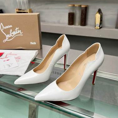 White Pointed-Toe Pumps
