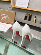 White Pointed-Toe Pumps