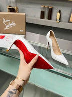 White Pointed-Toe Pumps