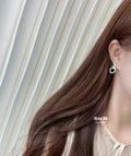 CC Hollow Heart Earrings
